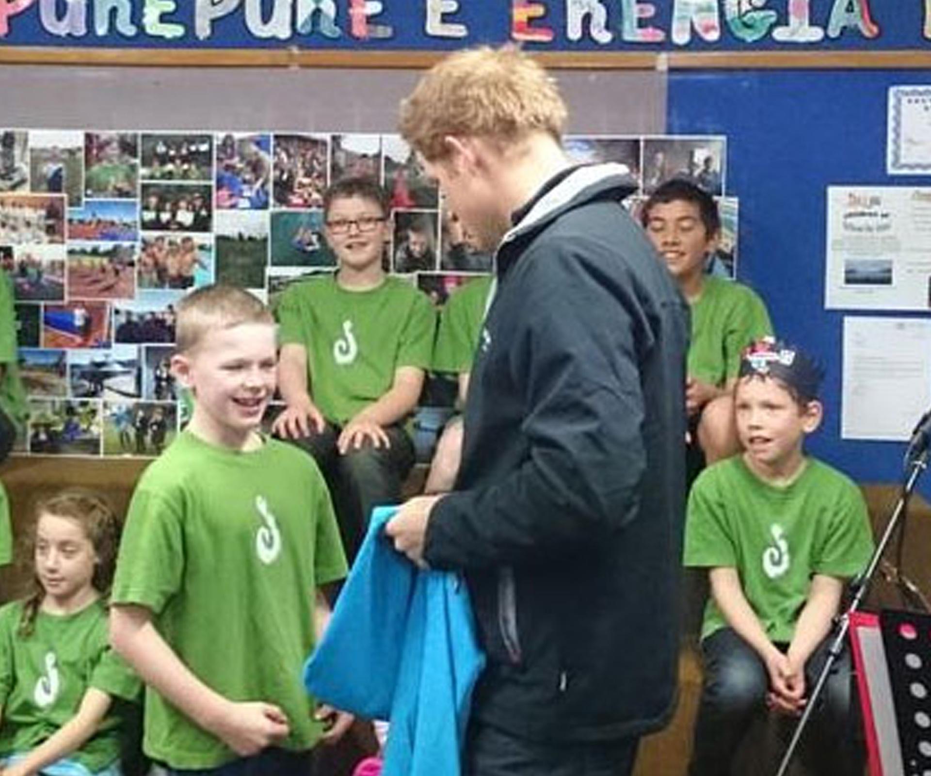 Prince Harry charms local school