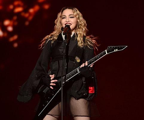 Madonna exposes fan’s breast on stage