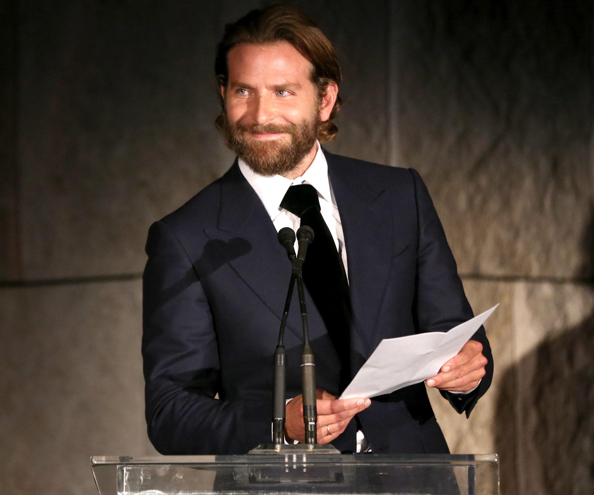 Bradley Cooper crashes an old mate’s wedding – and catches the bouquet!