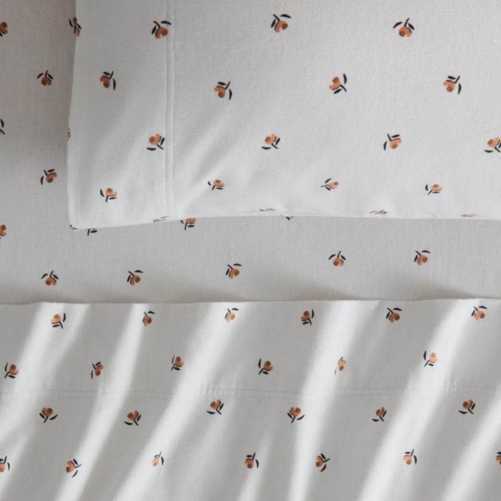 Flannelette sheet wet with floral detail against white background, from Sheridan Outlet