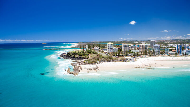 An aerial view looking at the famous Snapper Rocks and Rainbow bay at Coolanagatta on Queensland's Gold Coast
