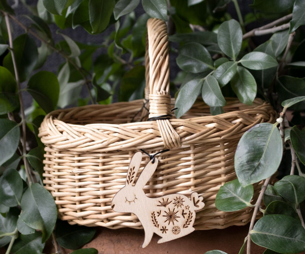 Wicker Easter basket with a bunny ornament