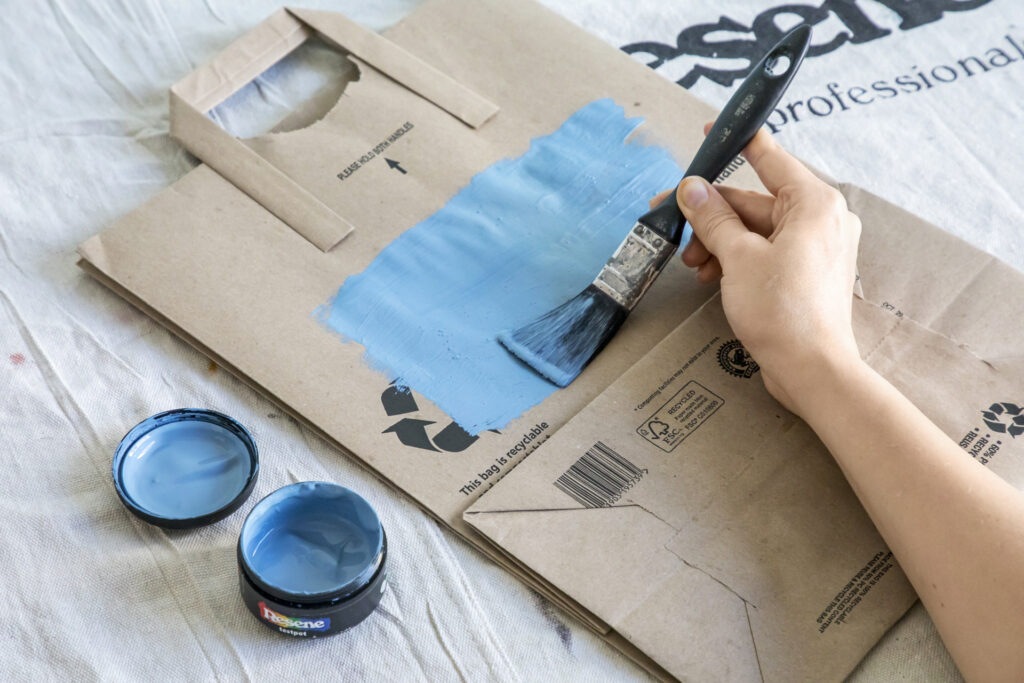 Painting paper bag light blue