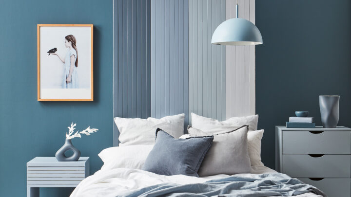 Ombre blue paint effect in bedroom
