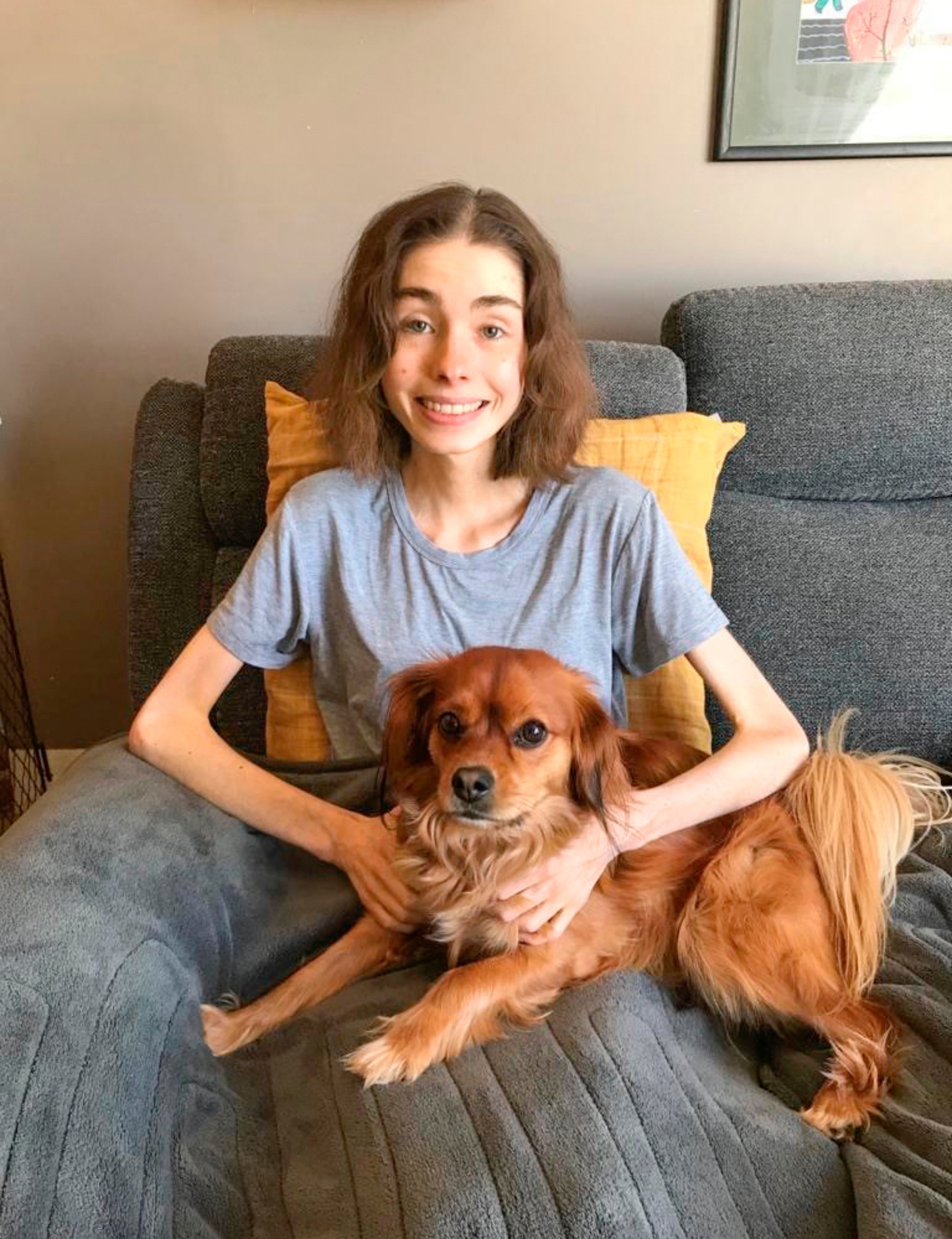 Millie Hardiman recovering with pup Benji.