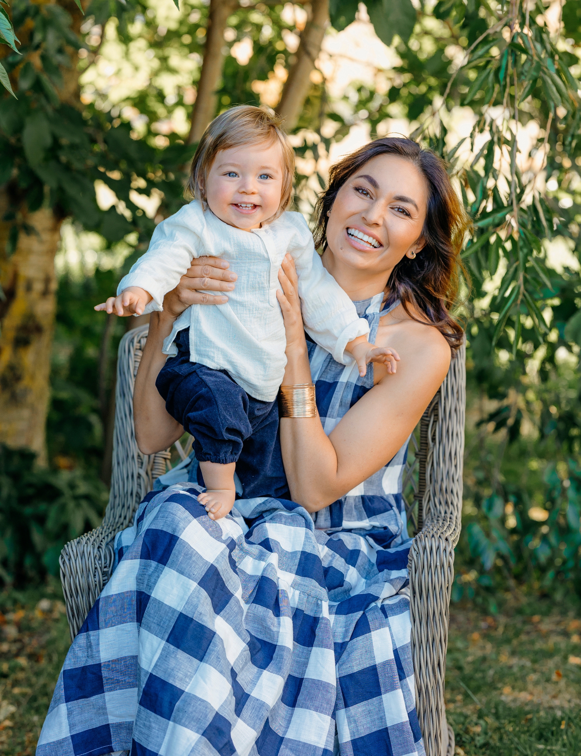Nadia Lim holding up baby Arlo