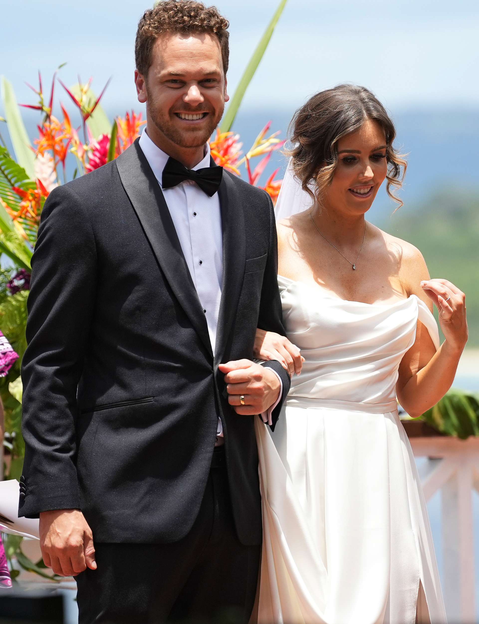 Jesse and CJ linked arms walking down the MAFS aisle