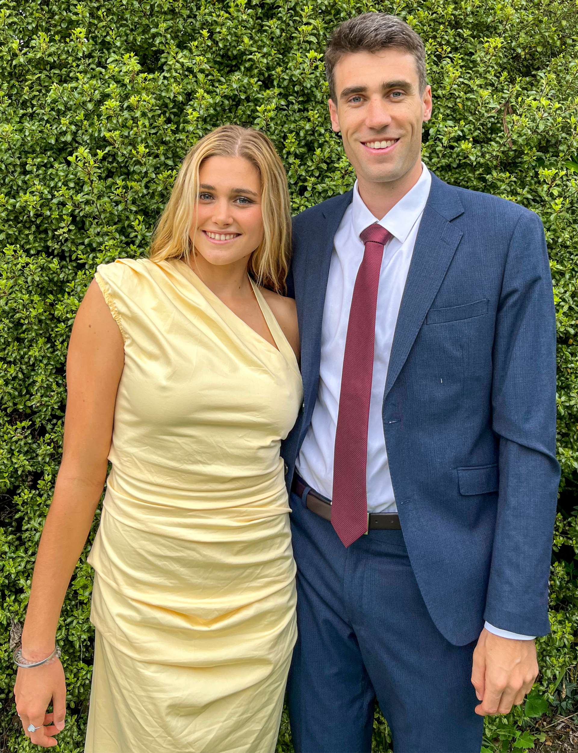 Hamish with his arm around girlfriend Maddie's shoulder