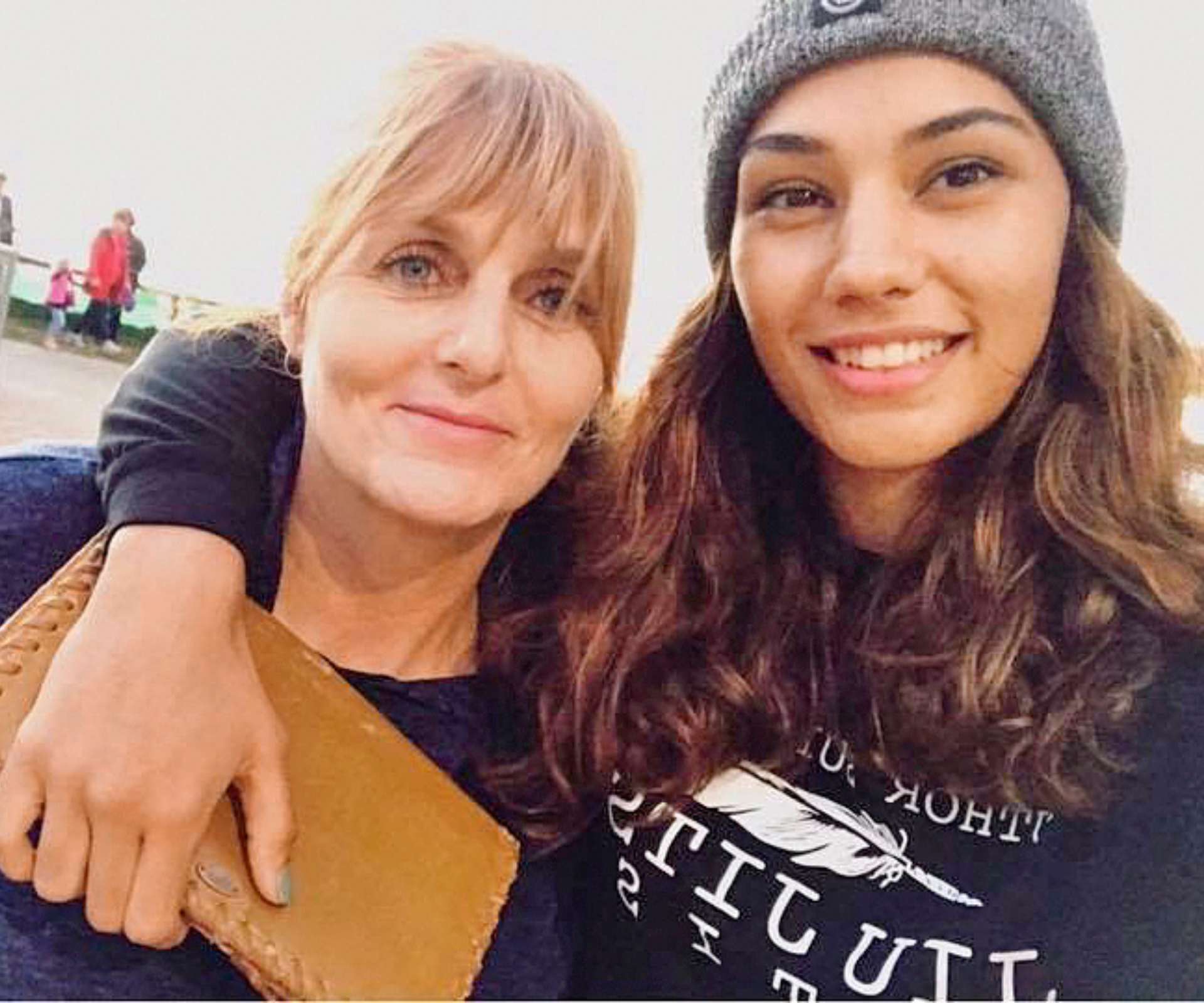 Janay with her arm over mum Brenda's shoulder