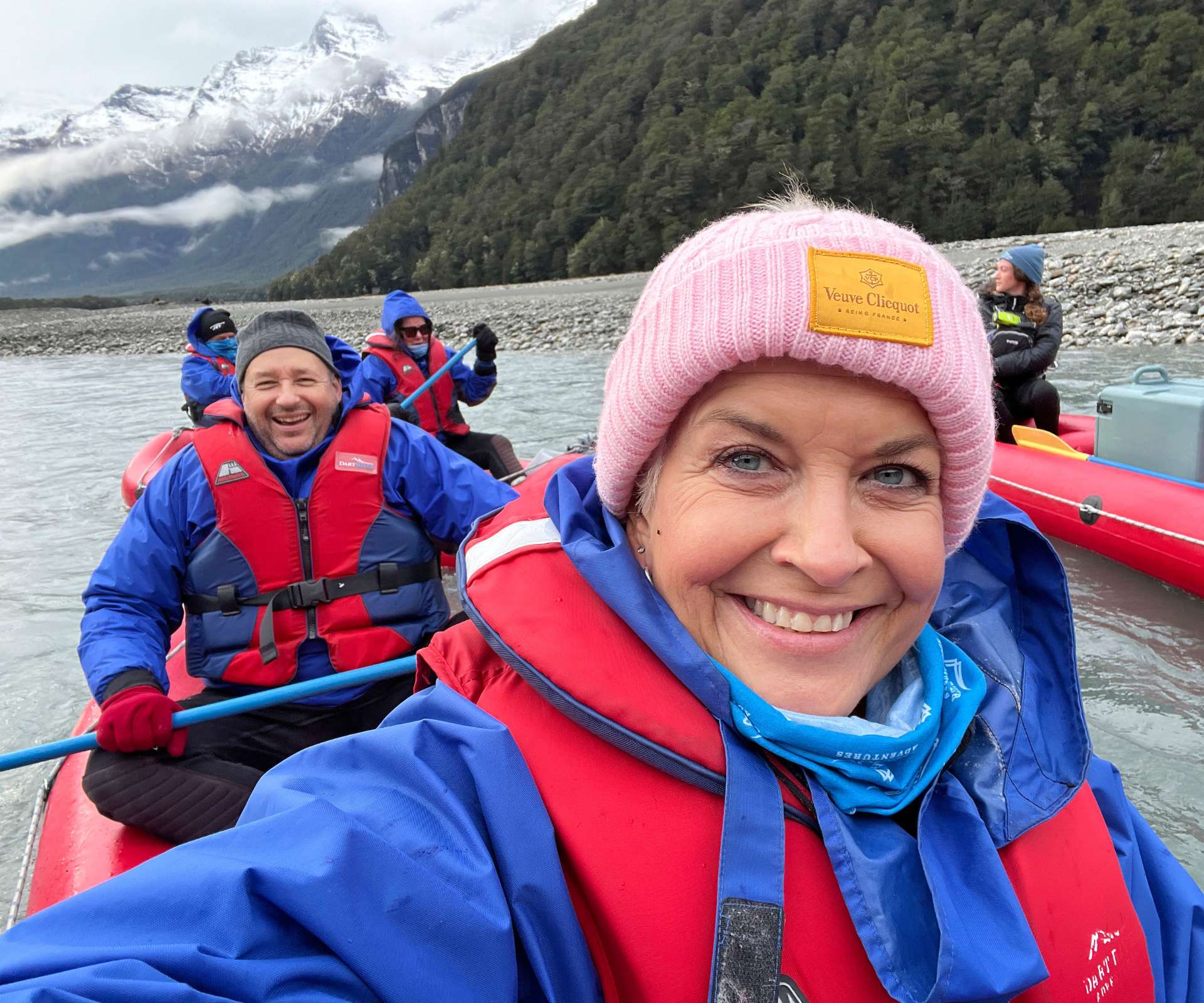 On a kayak together in Queenstown in front of showy mountains