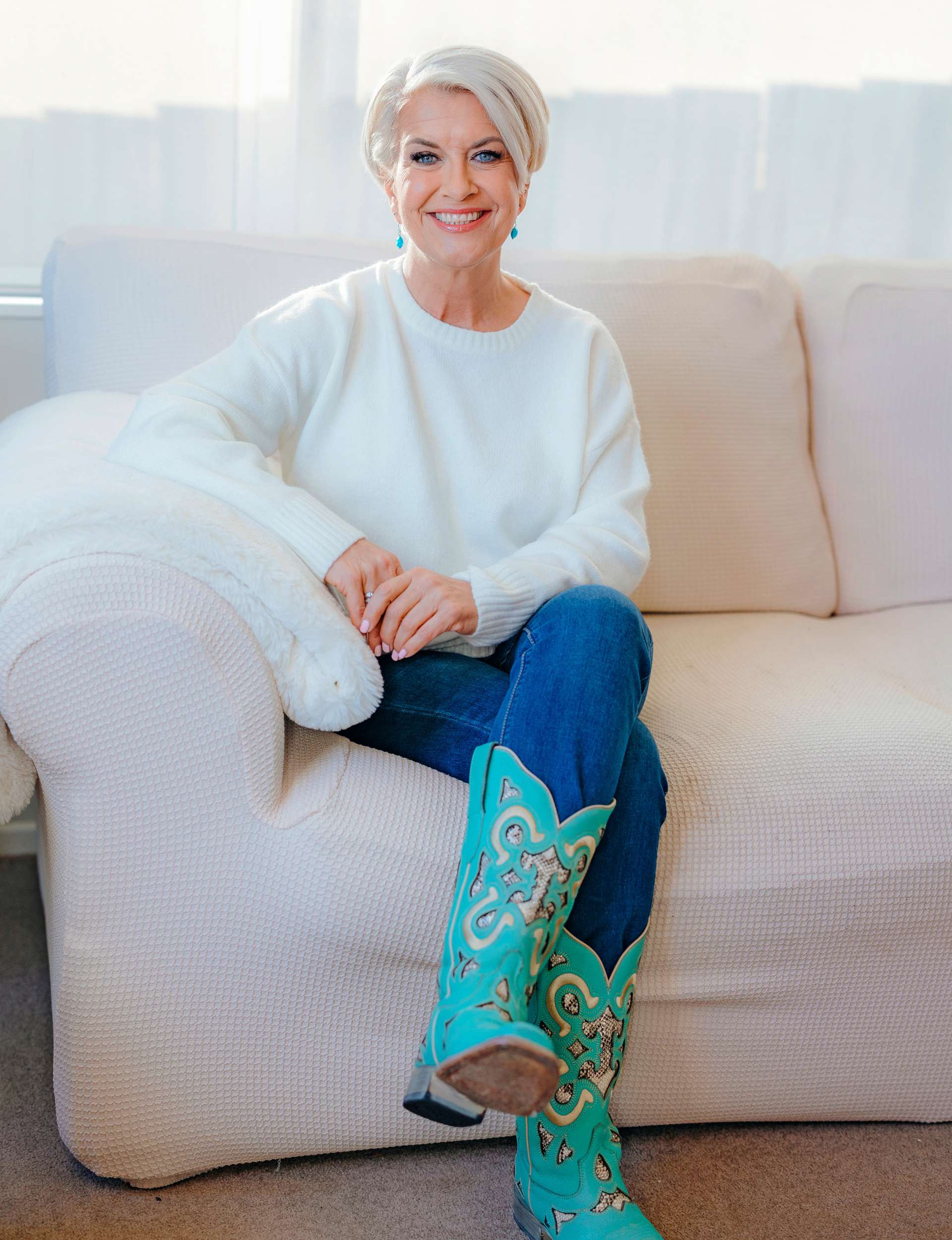 Lorna Riley sitting on a couch