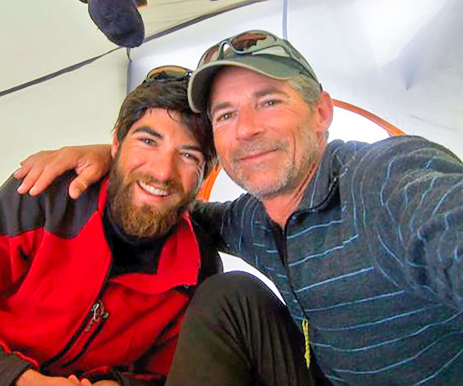 A selfie of Sequoia's father and brother in a tent