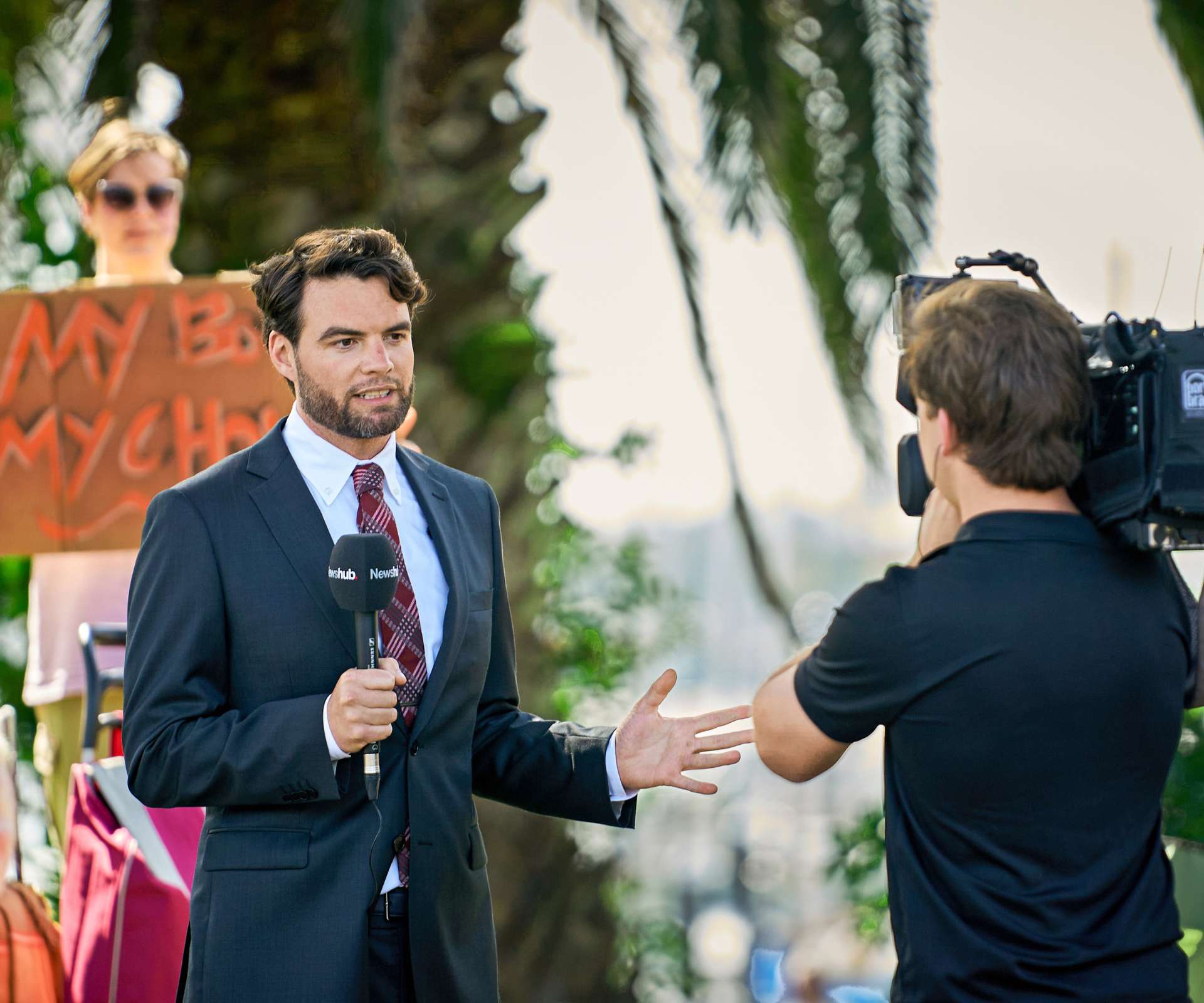 Ryan Bridge filming a scene from Madam