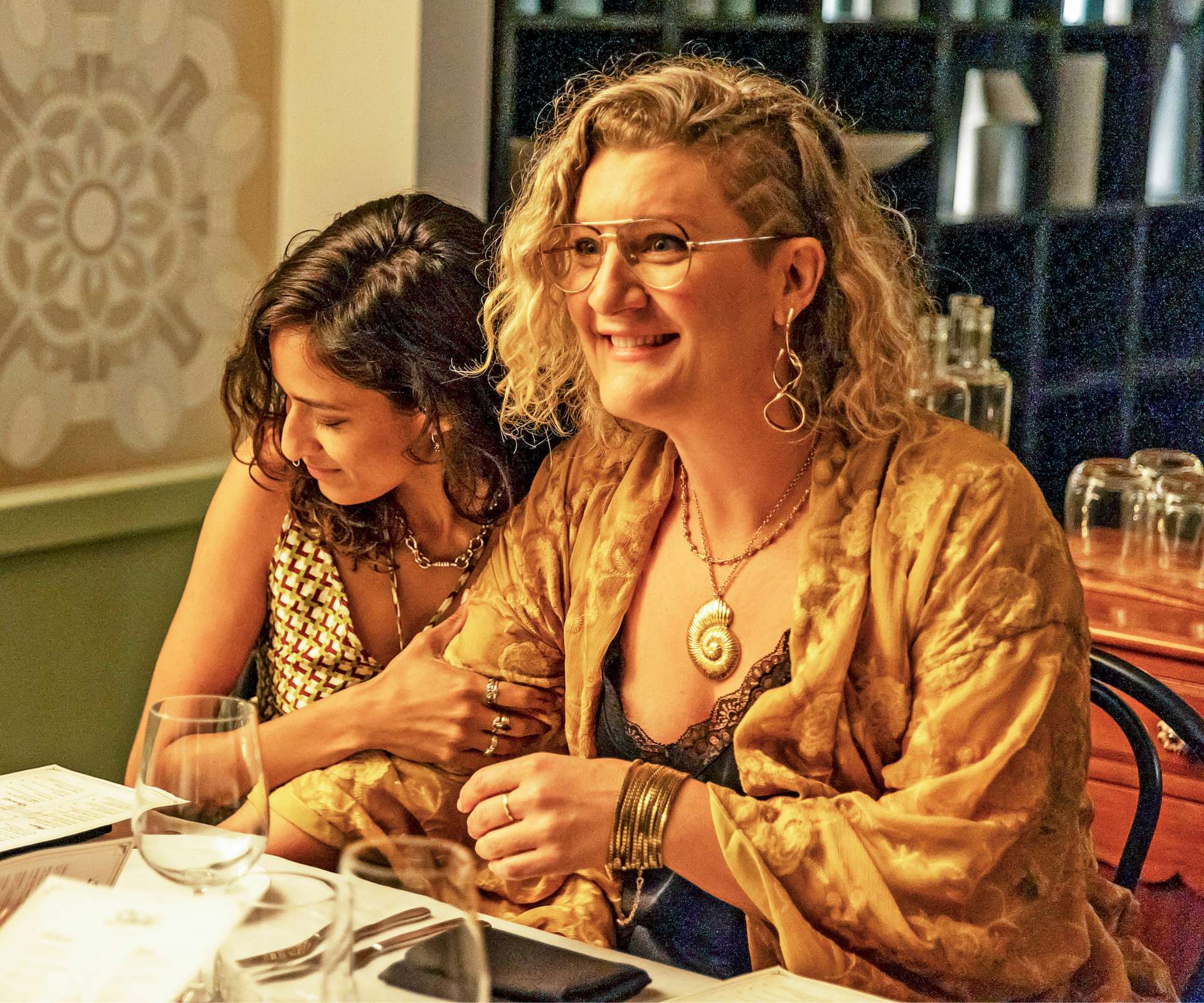 Virginia and her c-star Emma as a couple in Colin From Accounts.