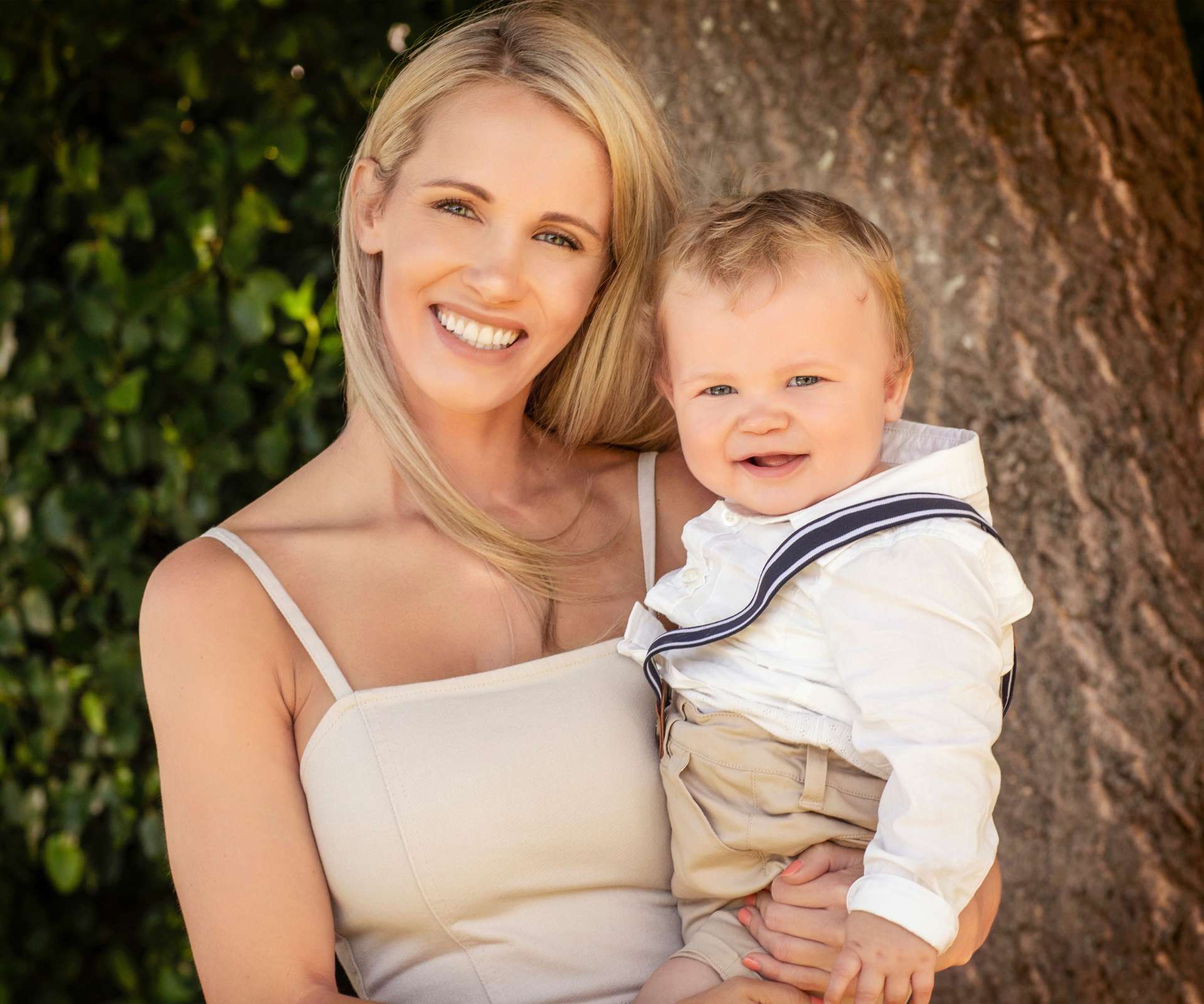 Hannah holding baby son Arlo