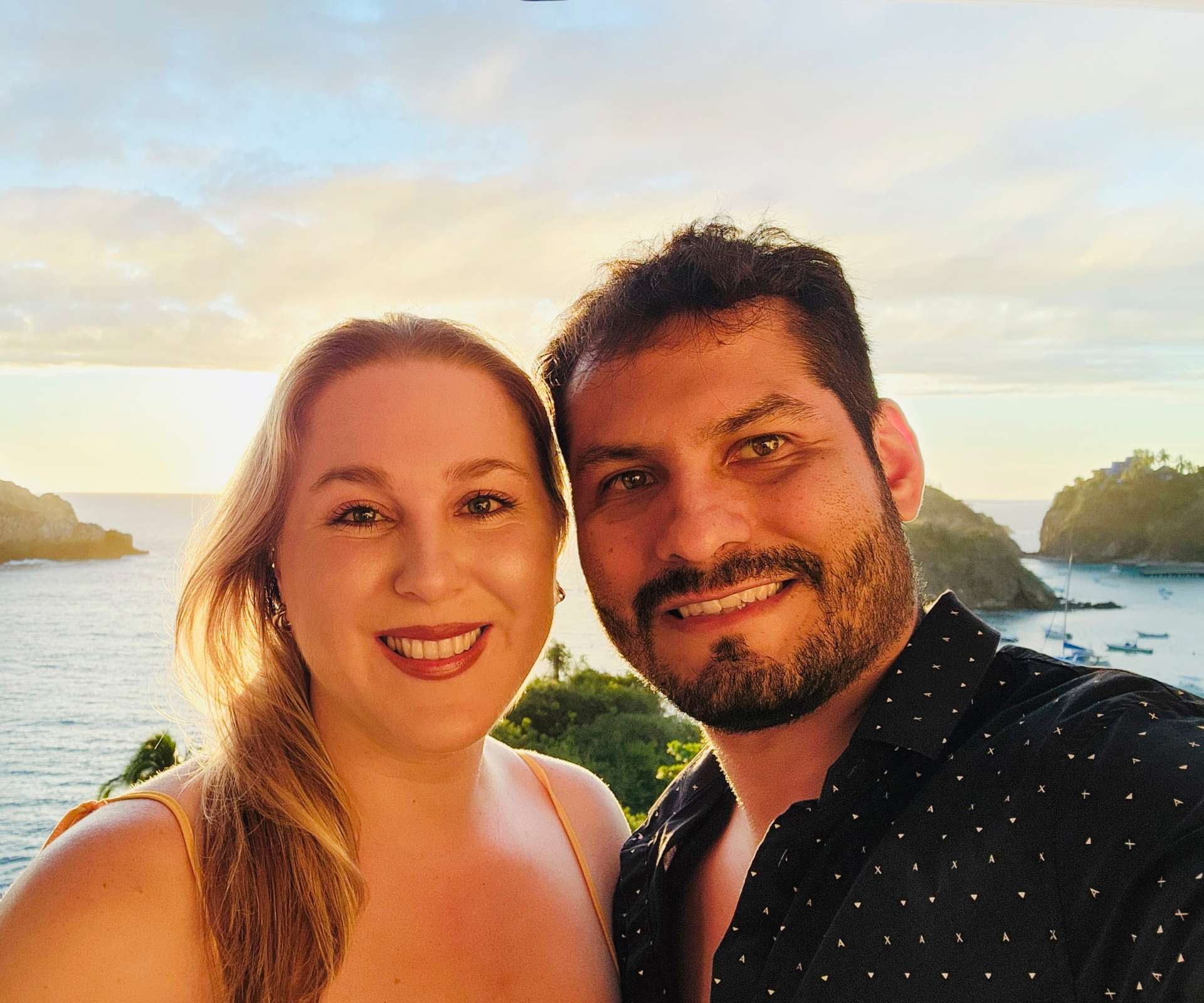 A selfie of Lonnene and husband Jose in front if the sea