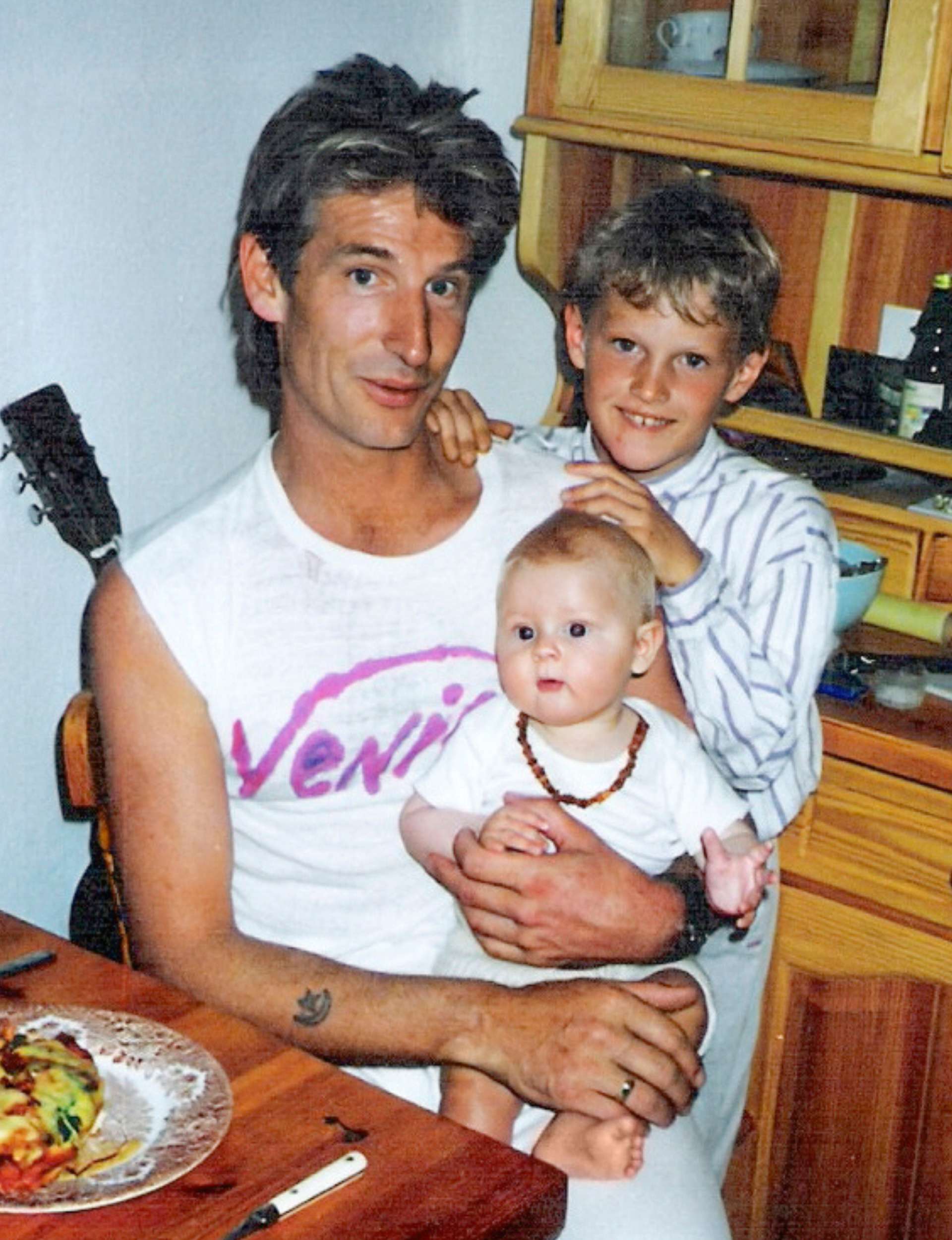 Dave McArtney with his kids in the 1990s