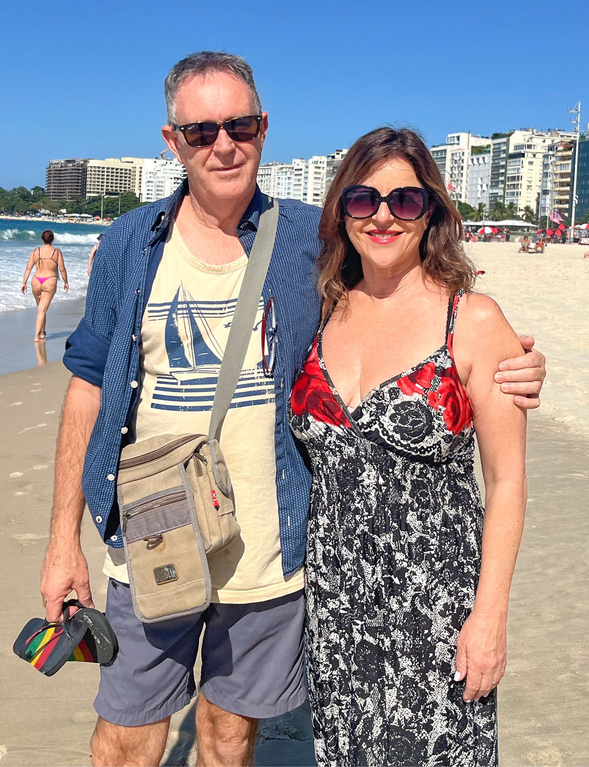 Sarah Bradley with Kevin on a beach in Rio