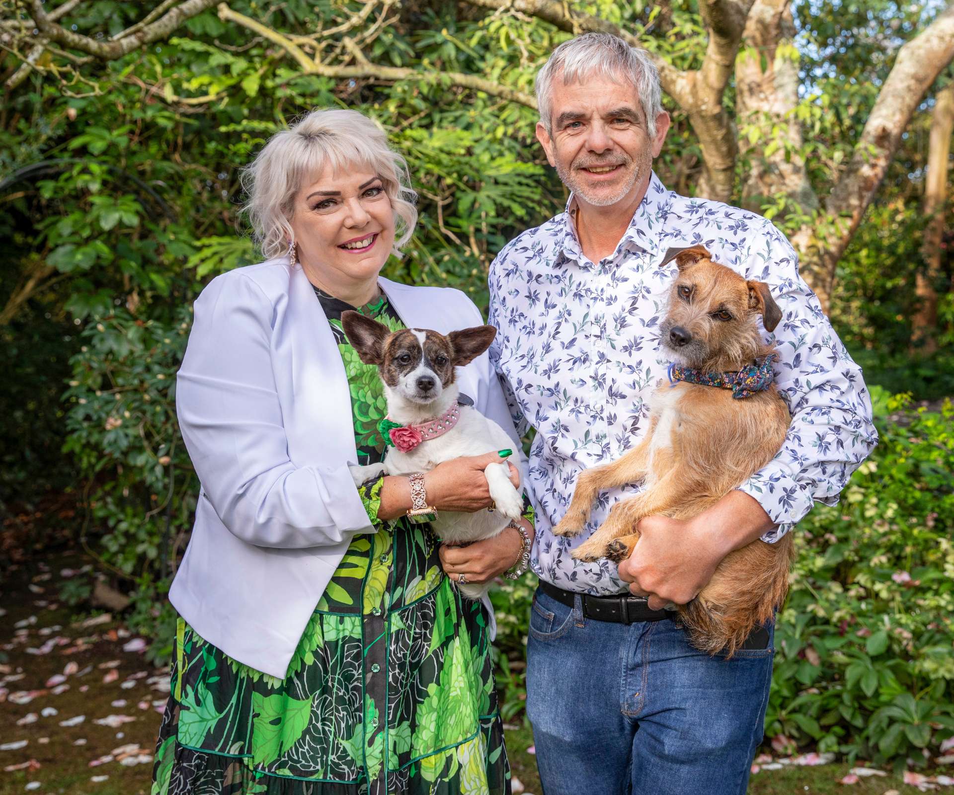 Phillippa Jacobs-Lory with her husband and their puppies