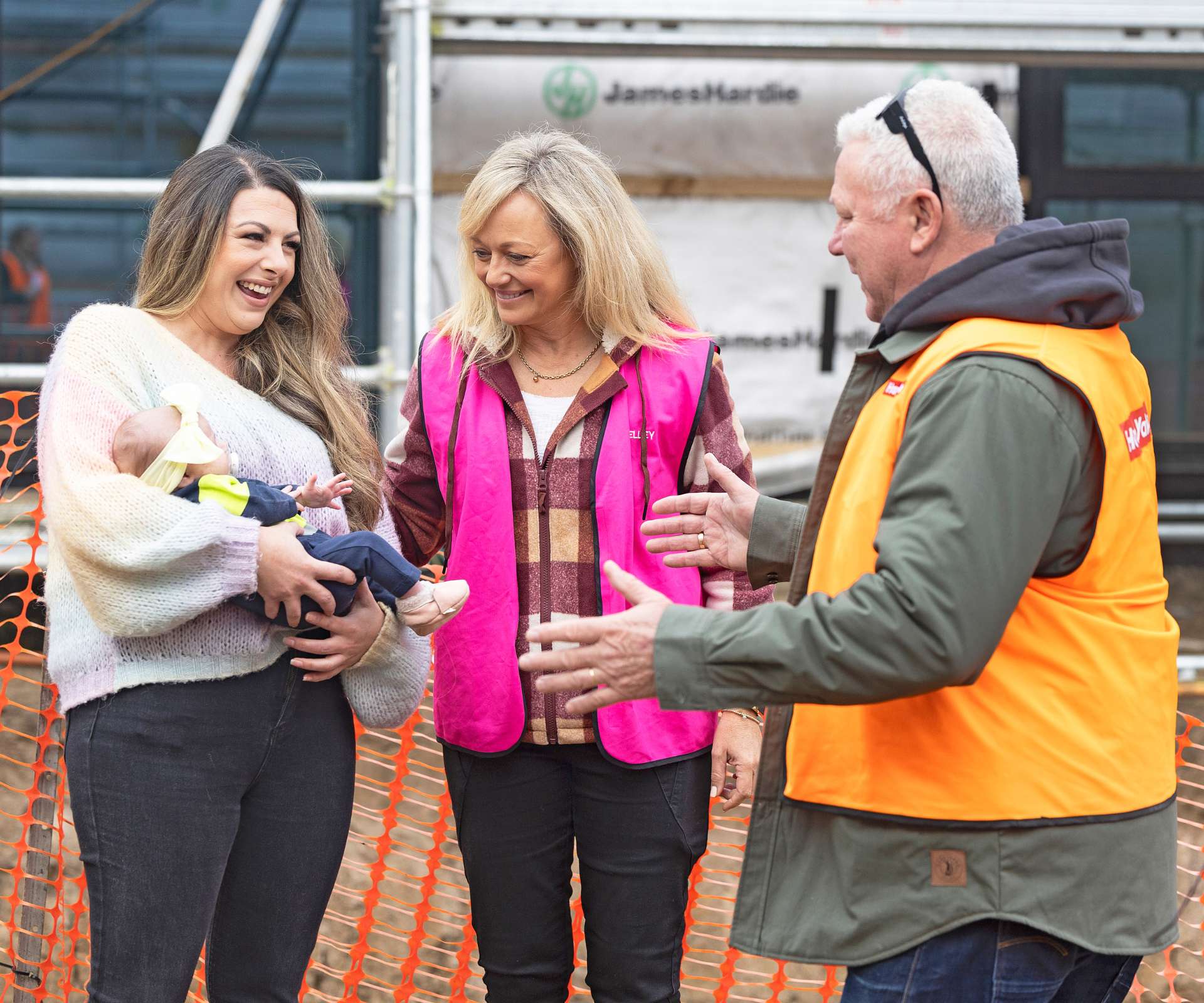 Chelsea introducing baby Matilda to The Block hosts