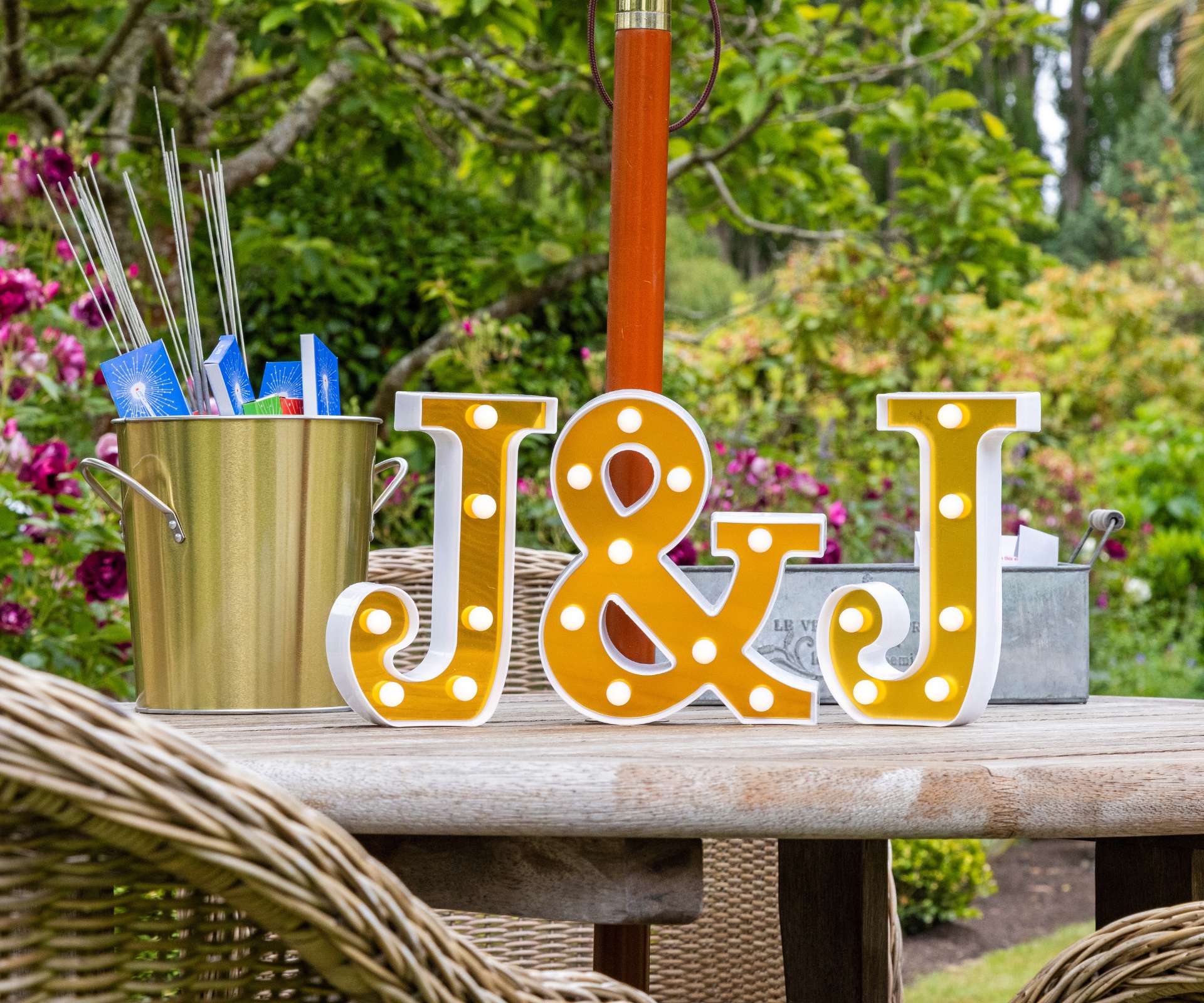 Two light-up J's on a table