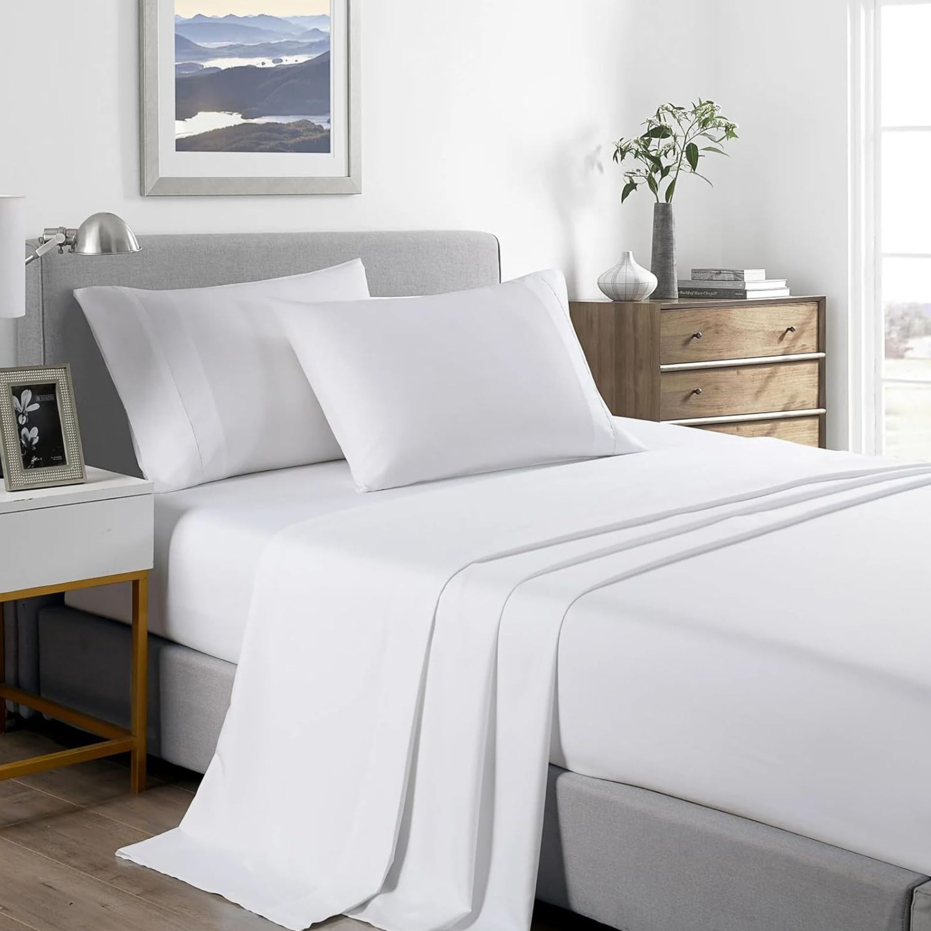 White sheet set in master bedroom