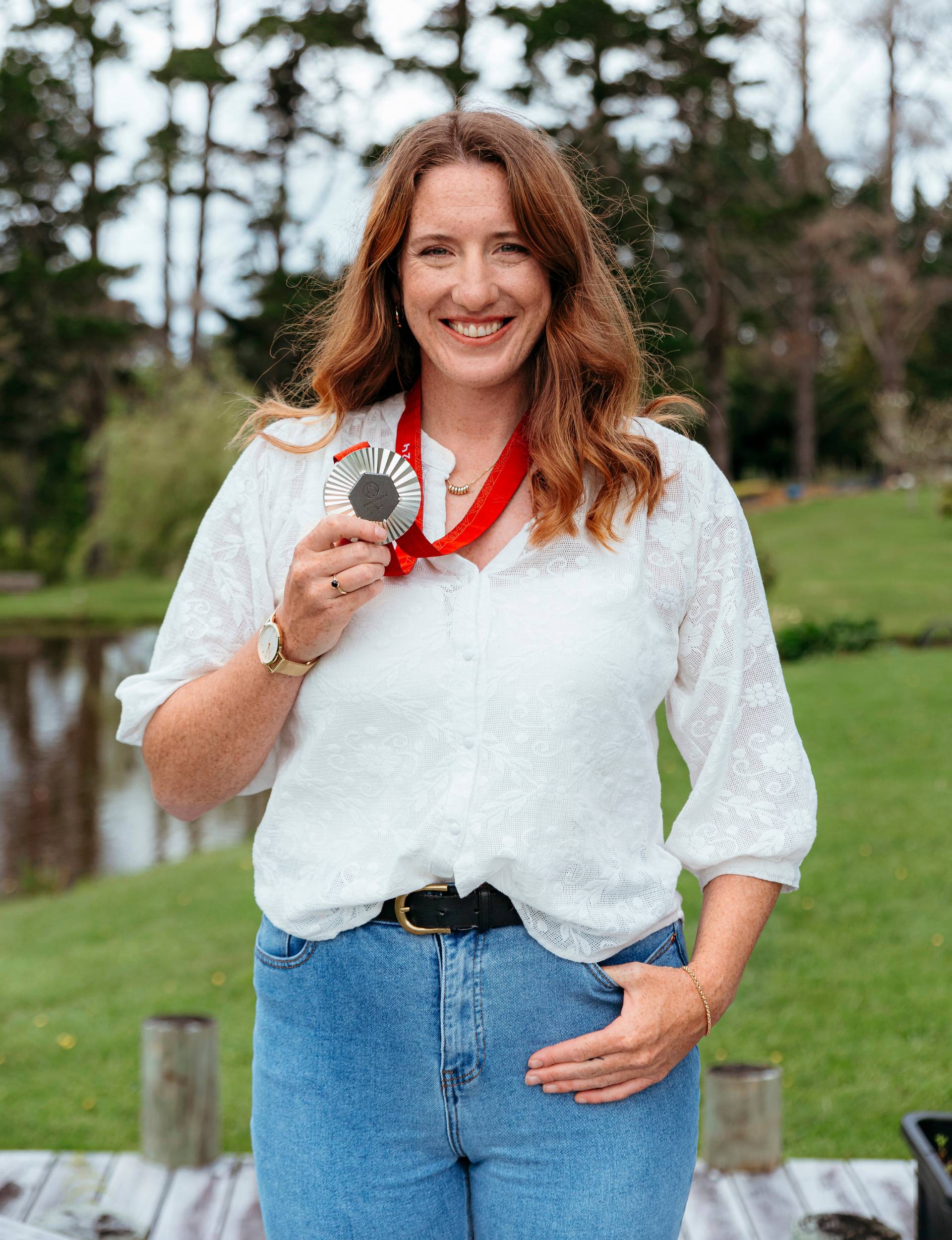 Anna holding her silver medal
