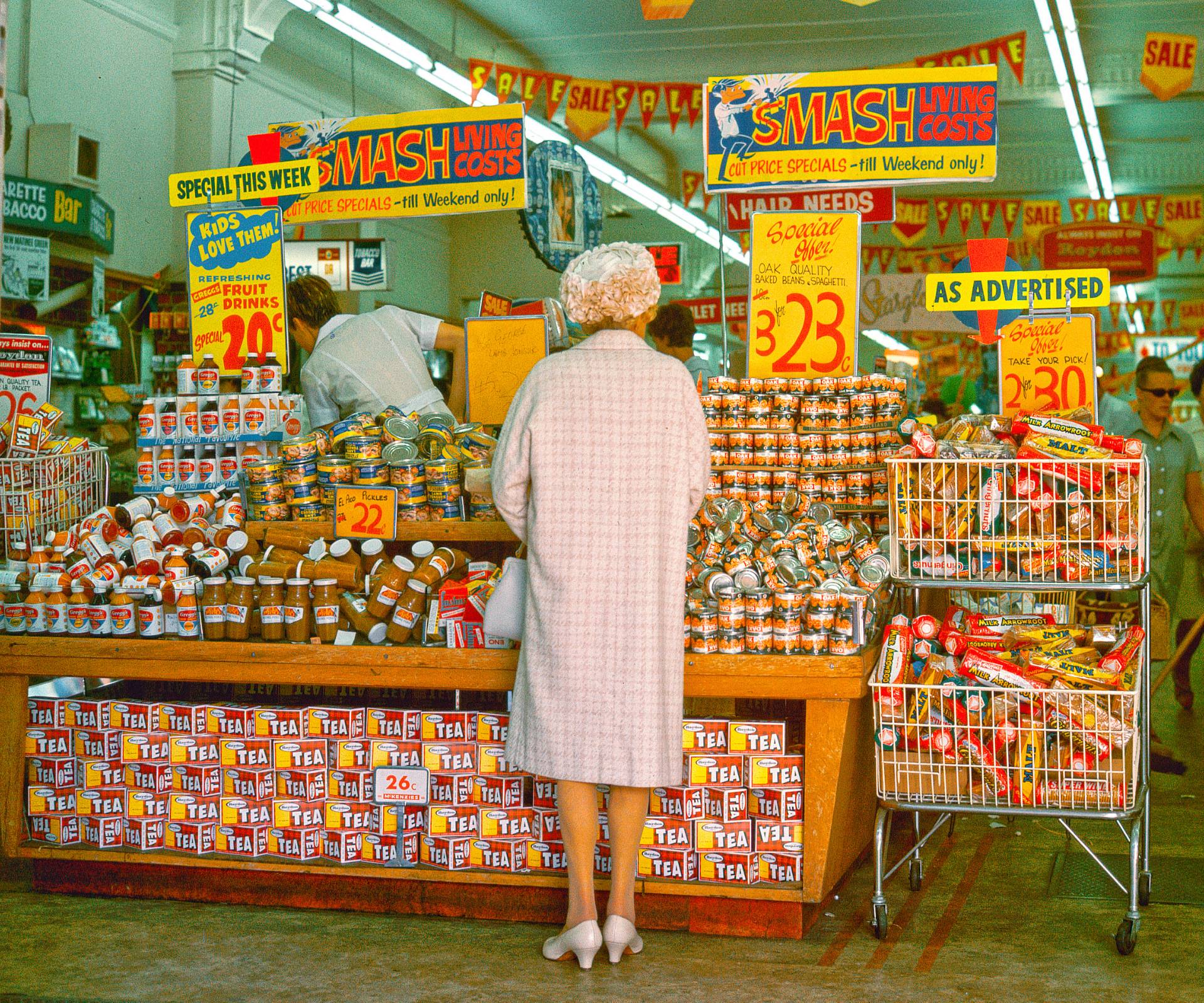 An elderly woman at a supermarket in 1975