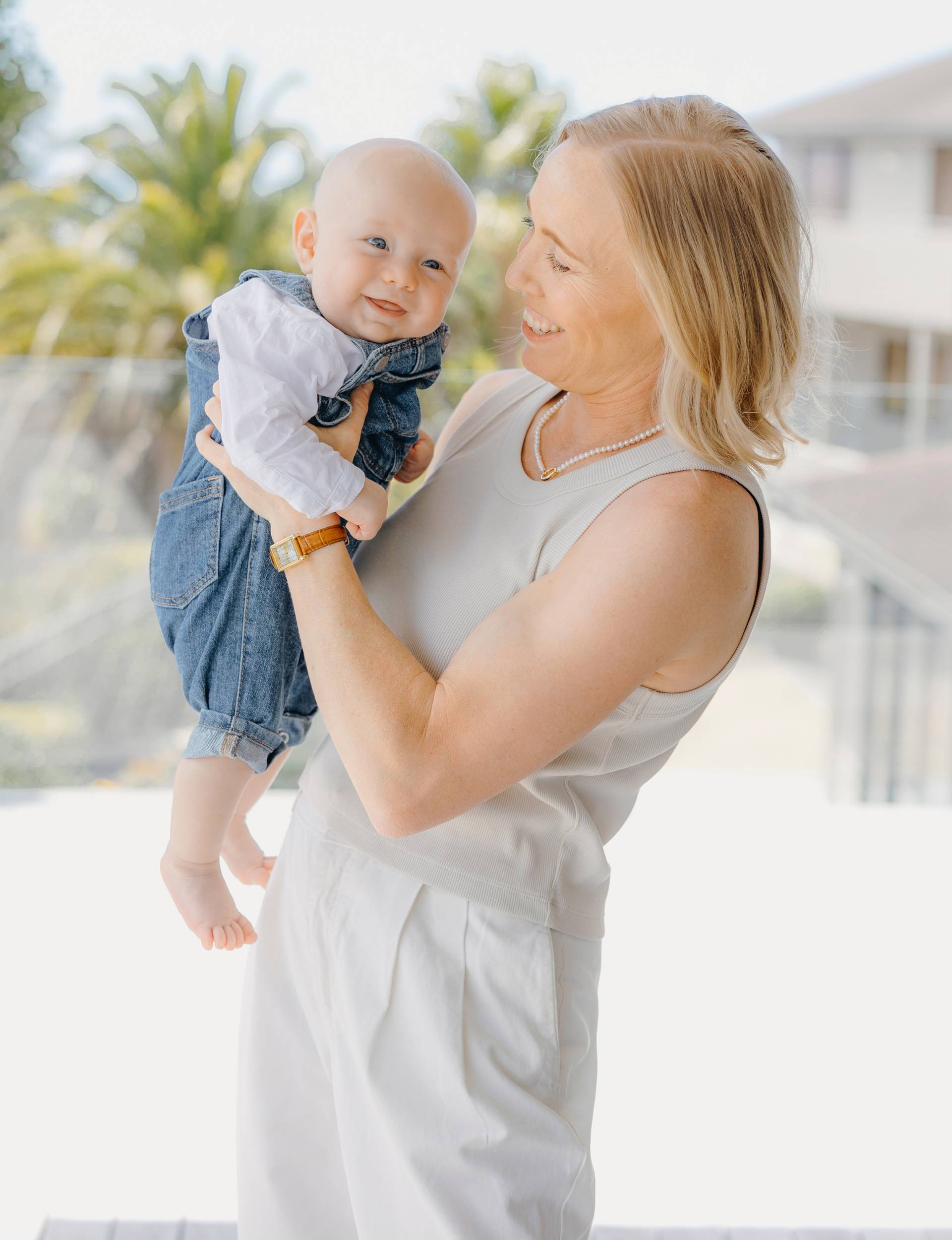 Betsy Hassett holding baby N&oacute;i
