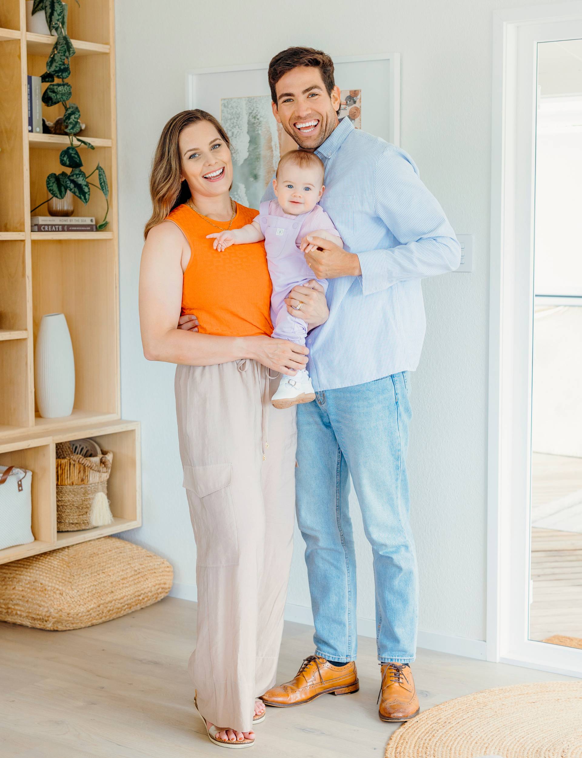 Jemma and Alvaro holding baby Francesca