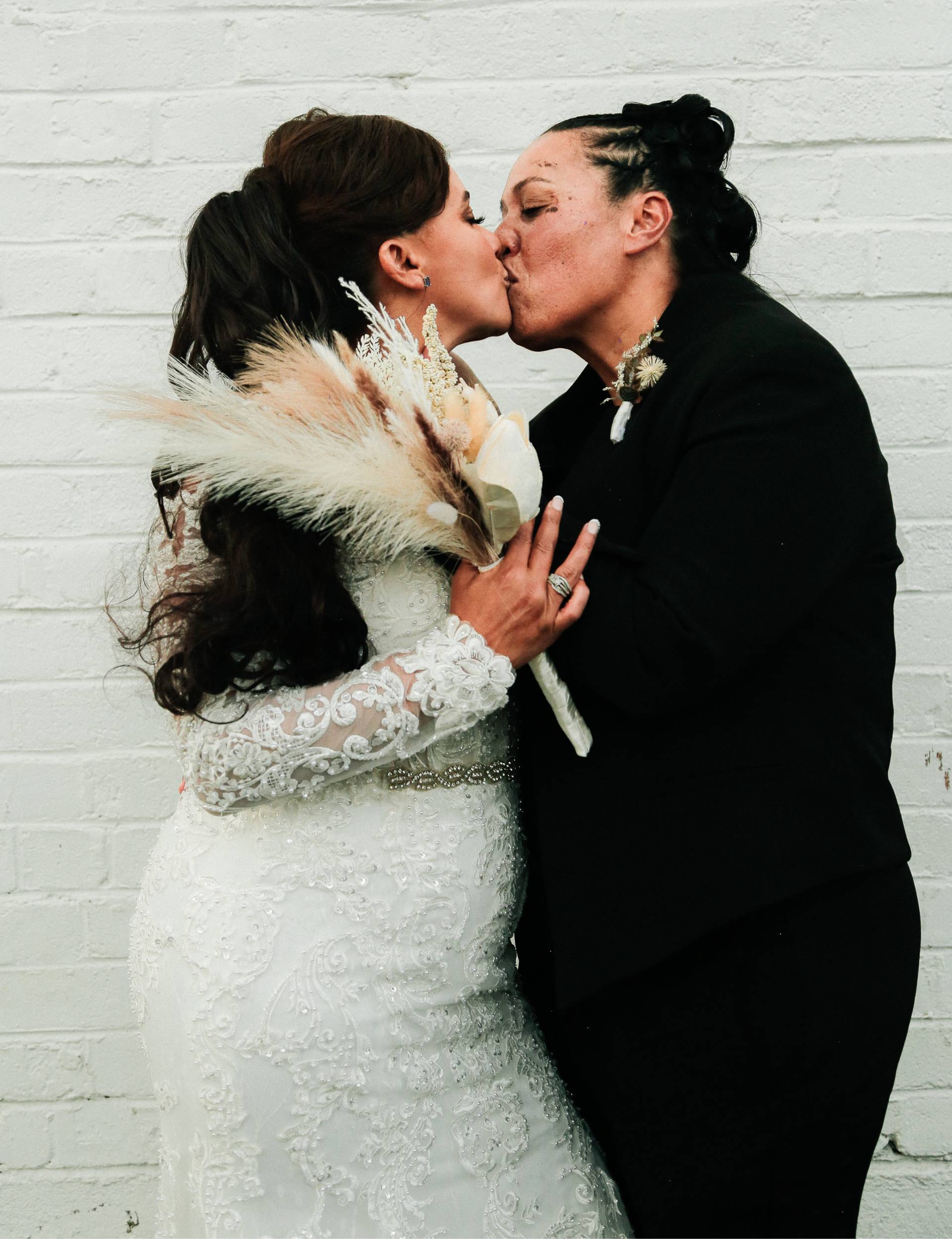 The newlyweds share a kiss