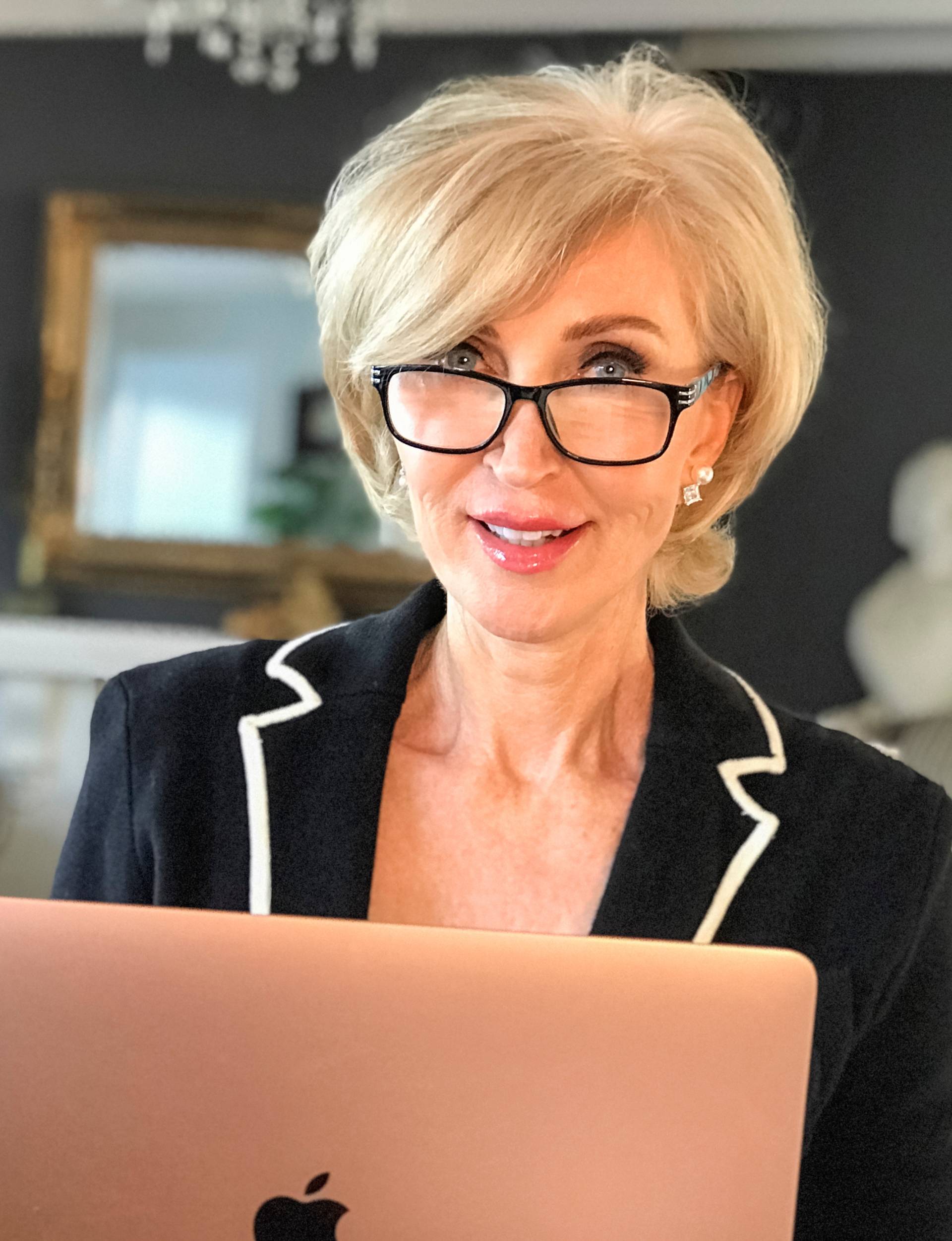 Julia working on her rose gold laptop