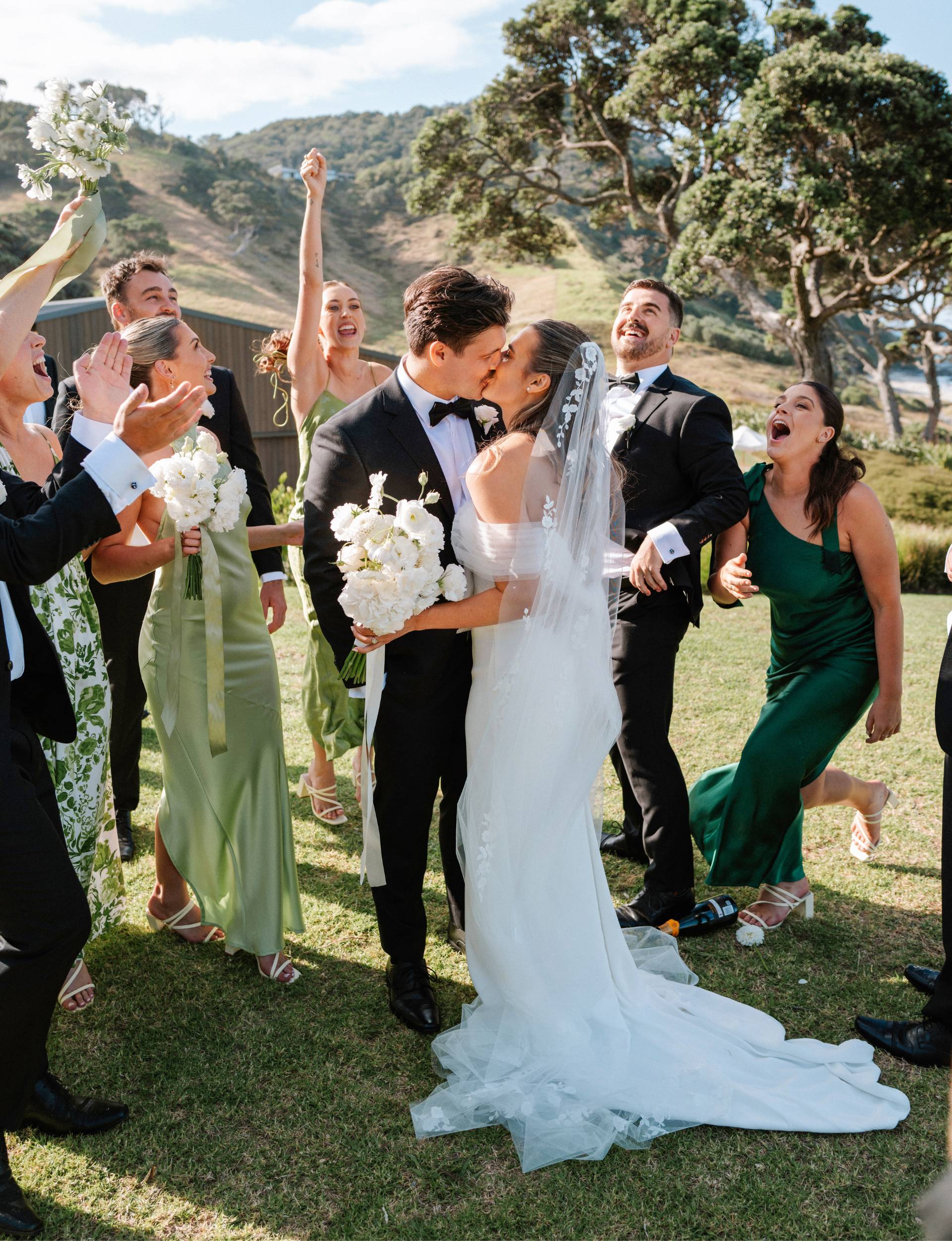 Healthy Kelsi kissing her husband on her wedding day