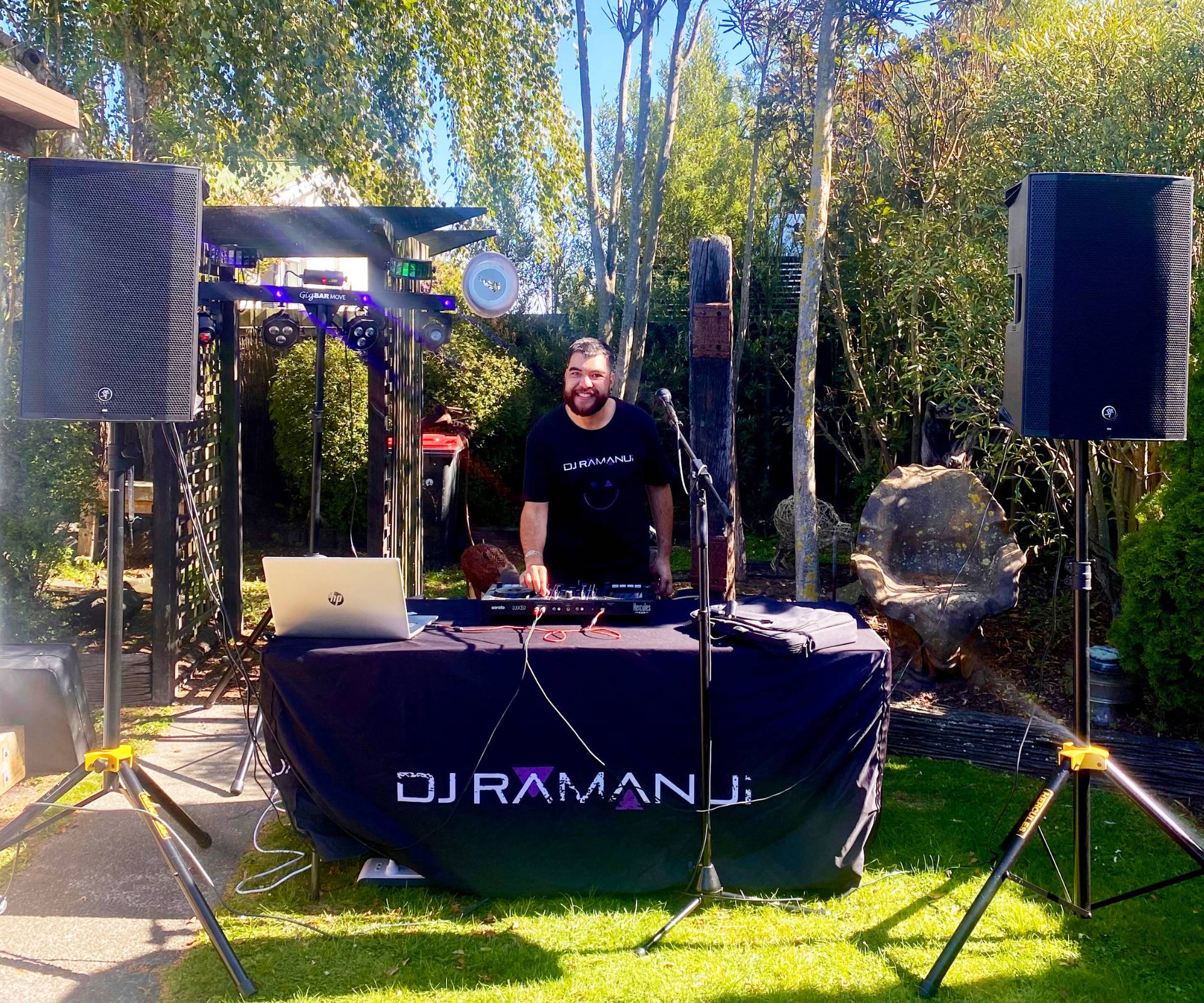 Te Ramanui Marriner playing his DJ decks outside