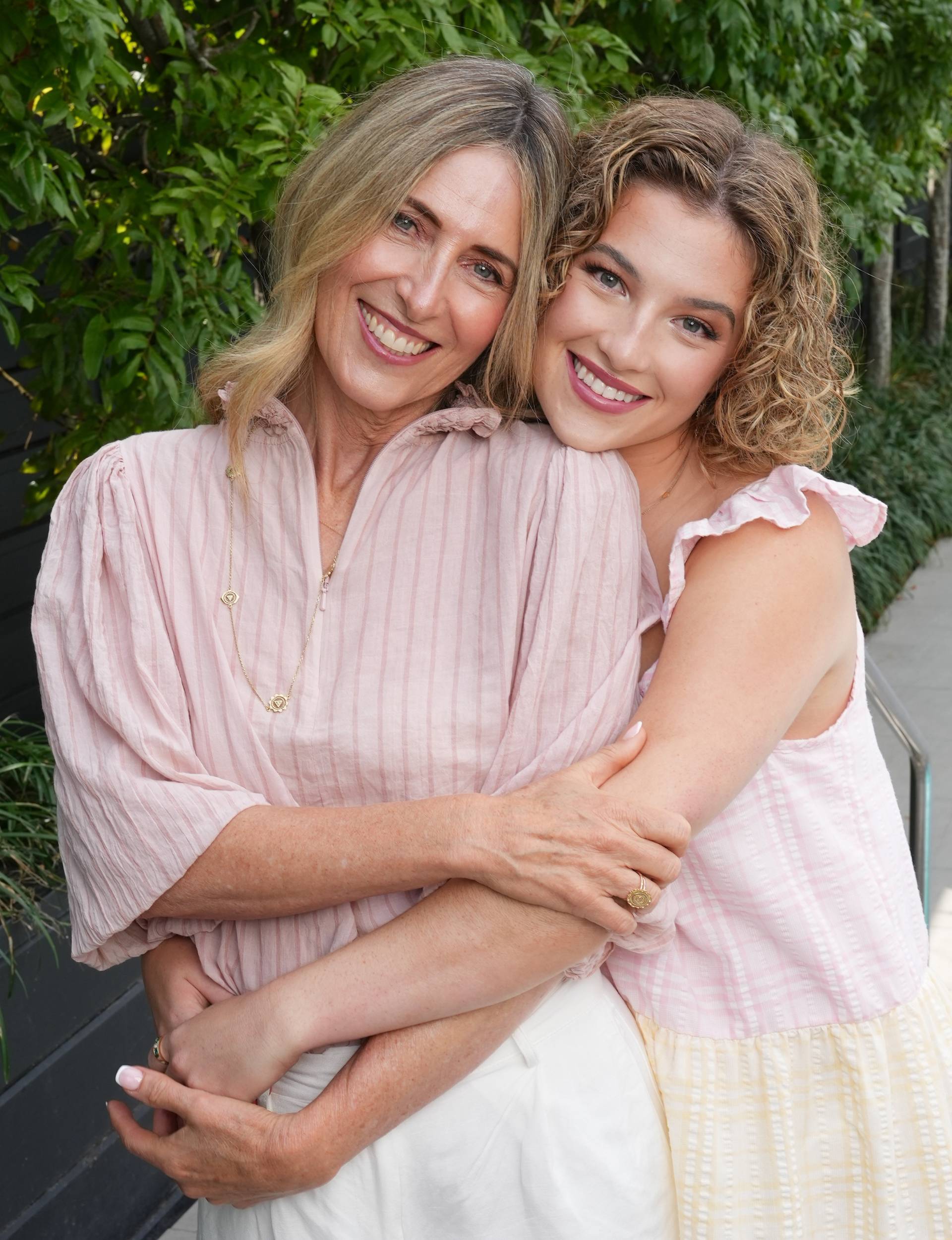 Madeleine McCarthy hugging her mum