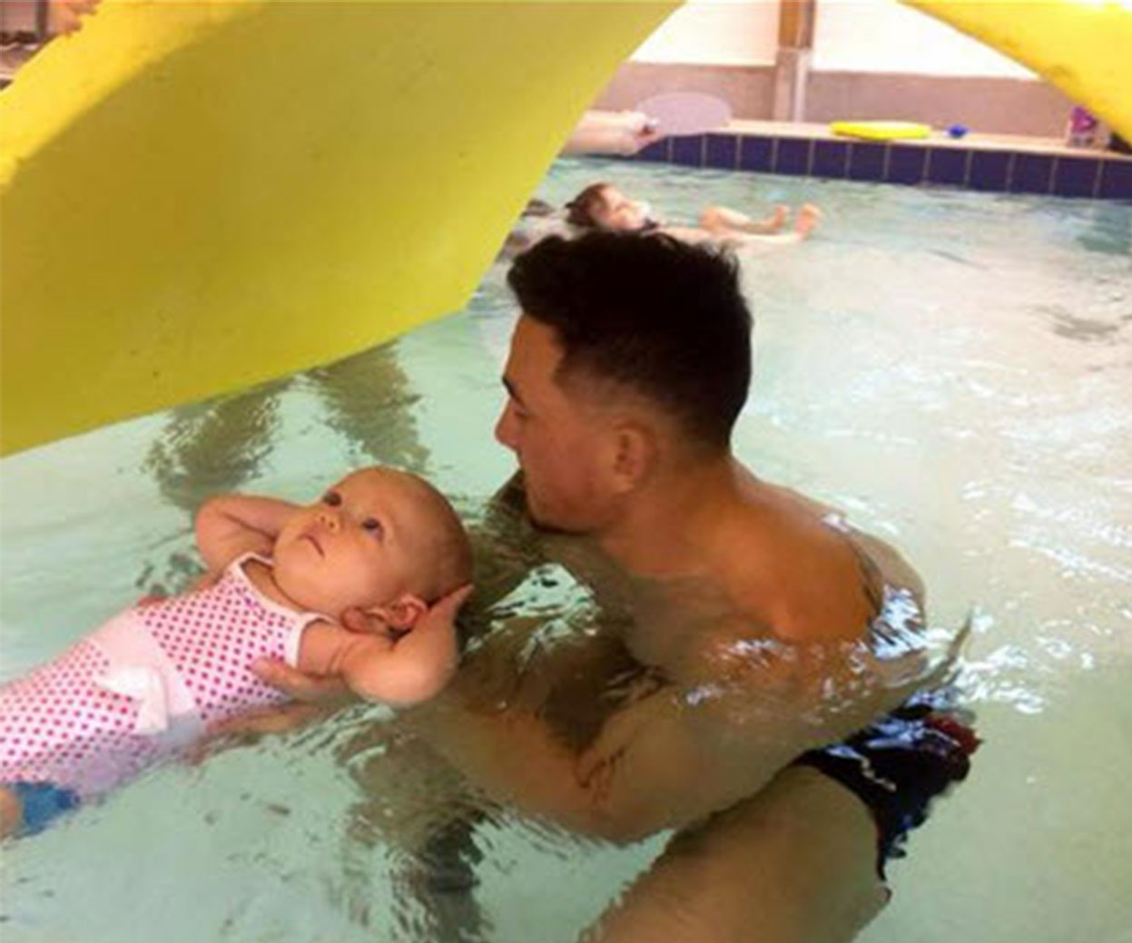 Sonny Bill Williams takes baby Imaan for a swim