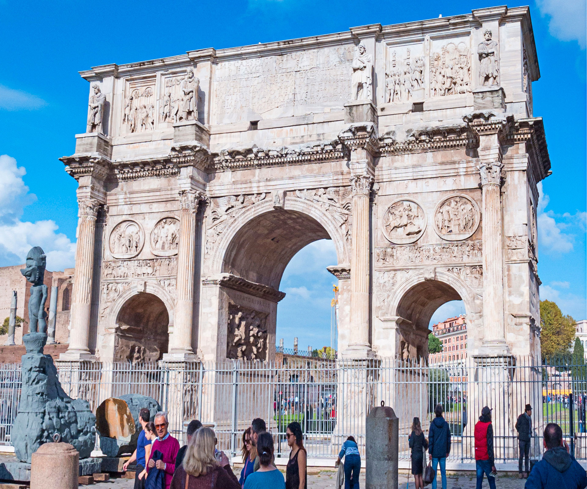 The Arch of Constantine was  built in 315 AD and is situated next to  the Colosseum.