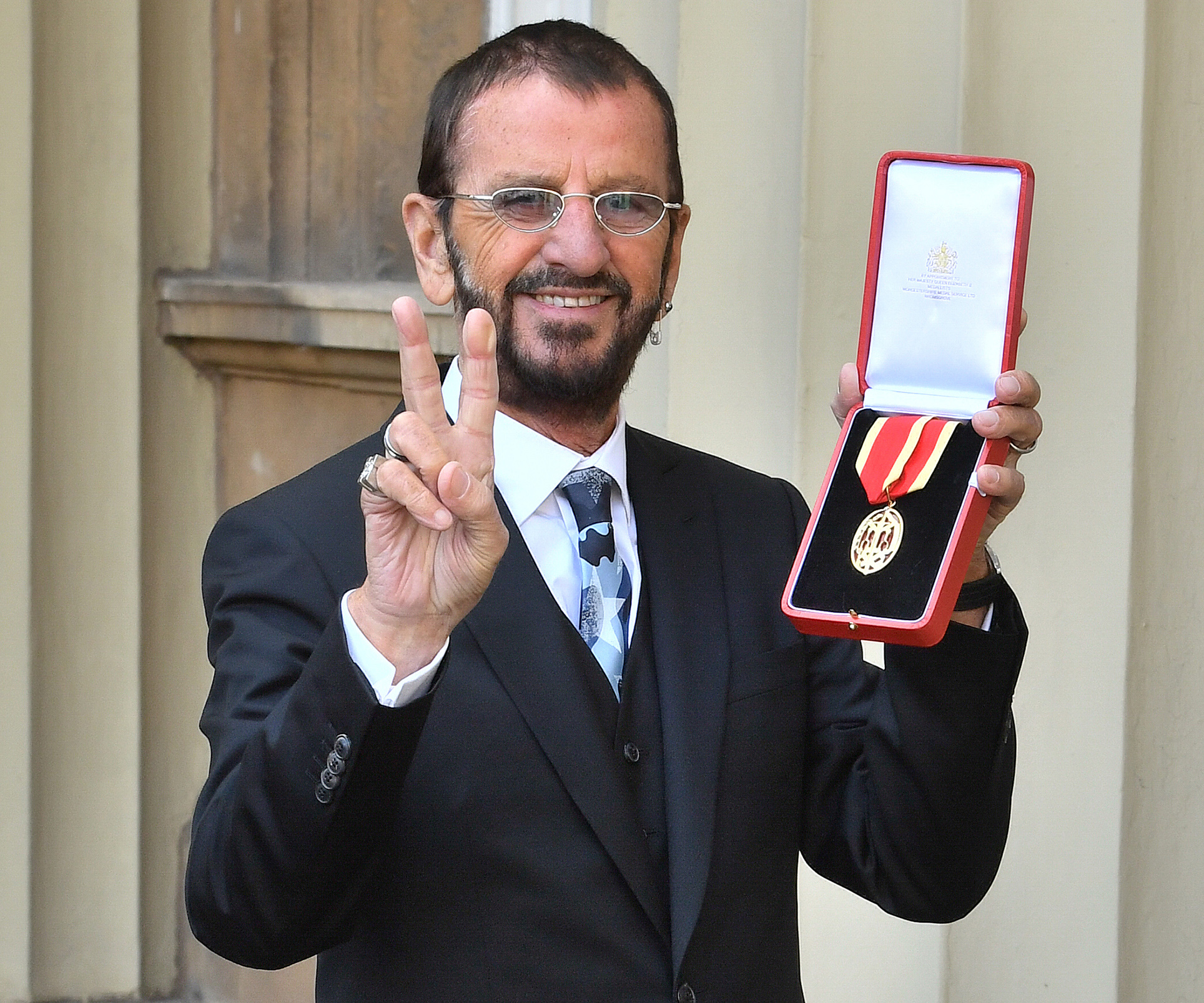 Arise, Sir Ringo Starr! Beatles drummer is knighted by Prince William