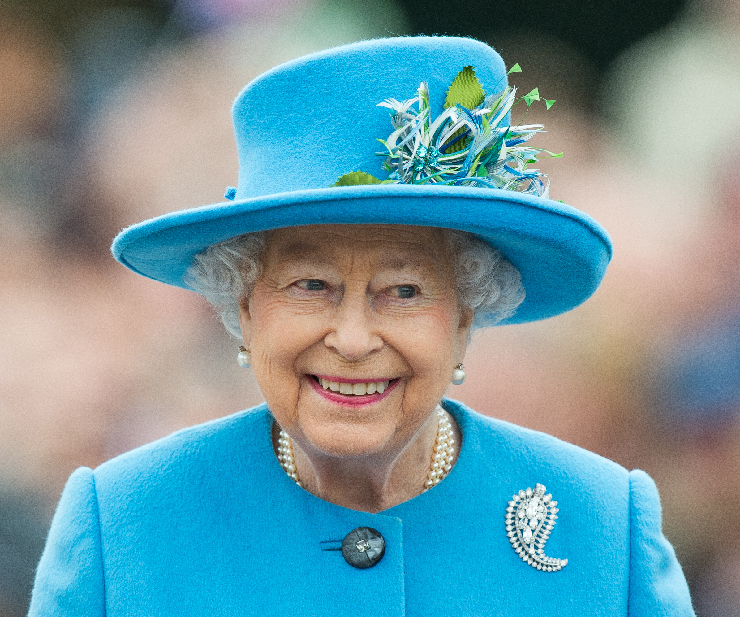 The real reason why The Queen wears super colourful outfits