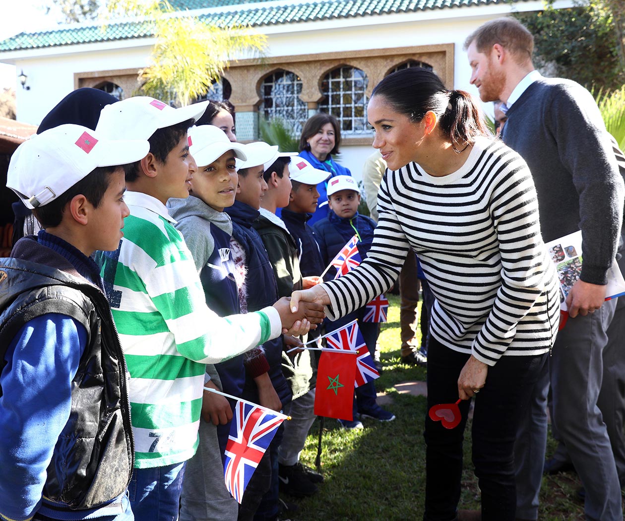 meghan markle and prince harry greet children in morocco
