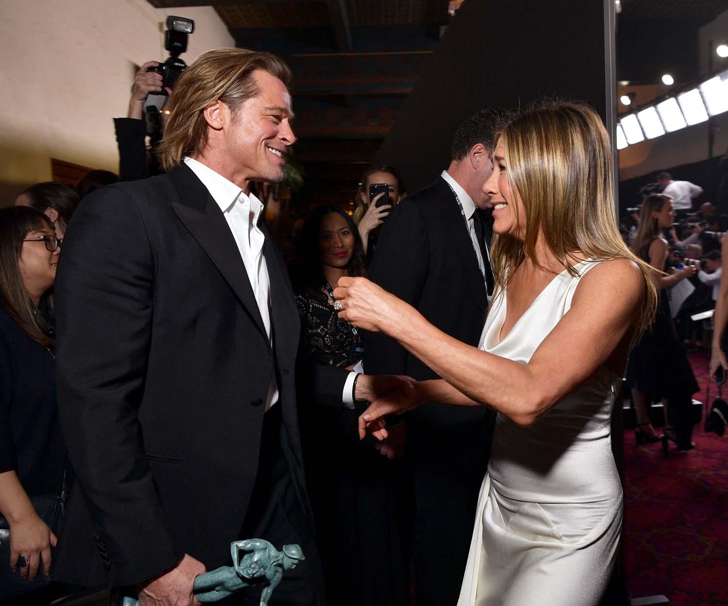 Will Brad Pitt and Jen Aniston get back together? We asked a body language expert to analyse their interactions