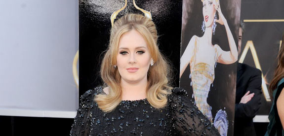 Adele gives mini Oscar to son