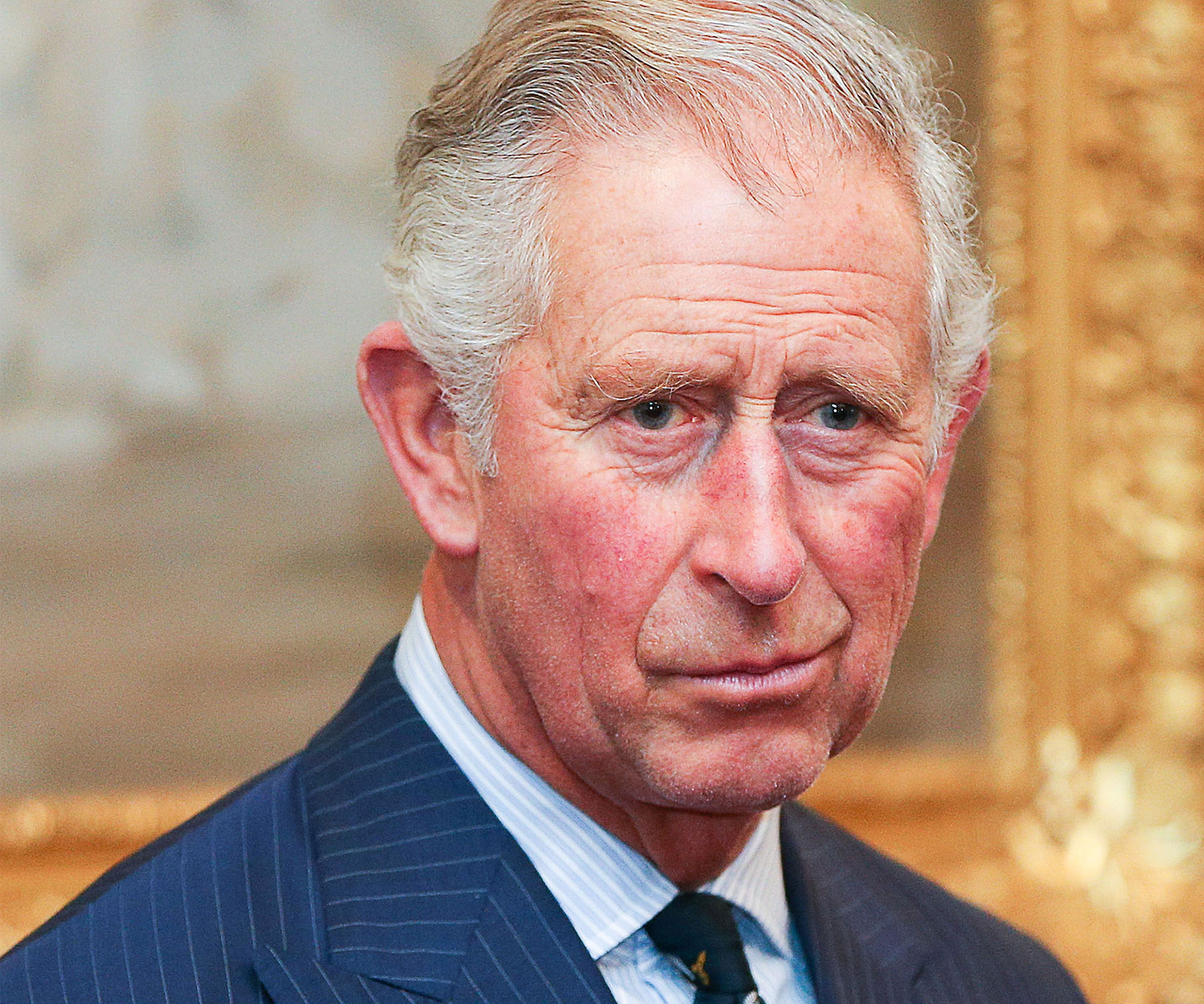 Woman steals a snog from Prince Charles
