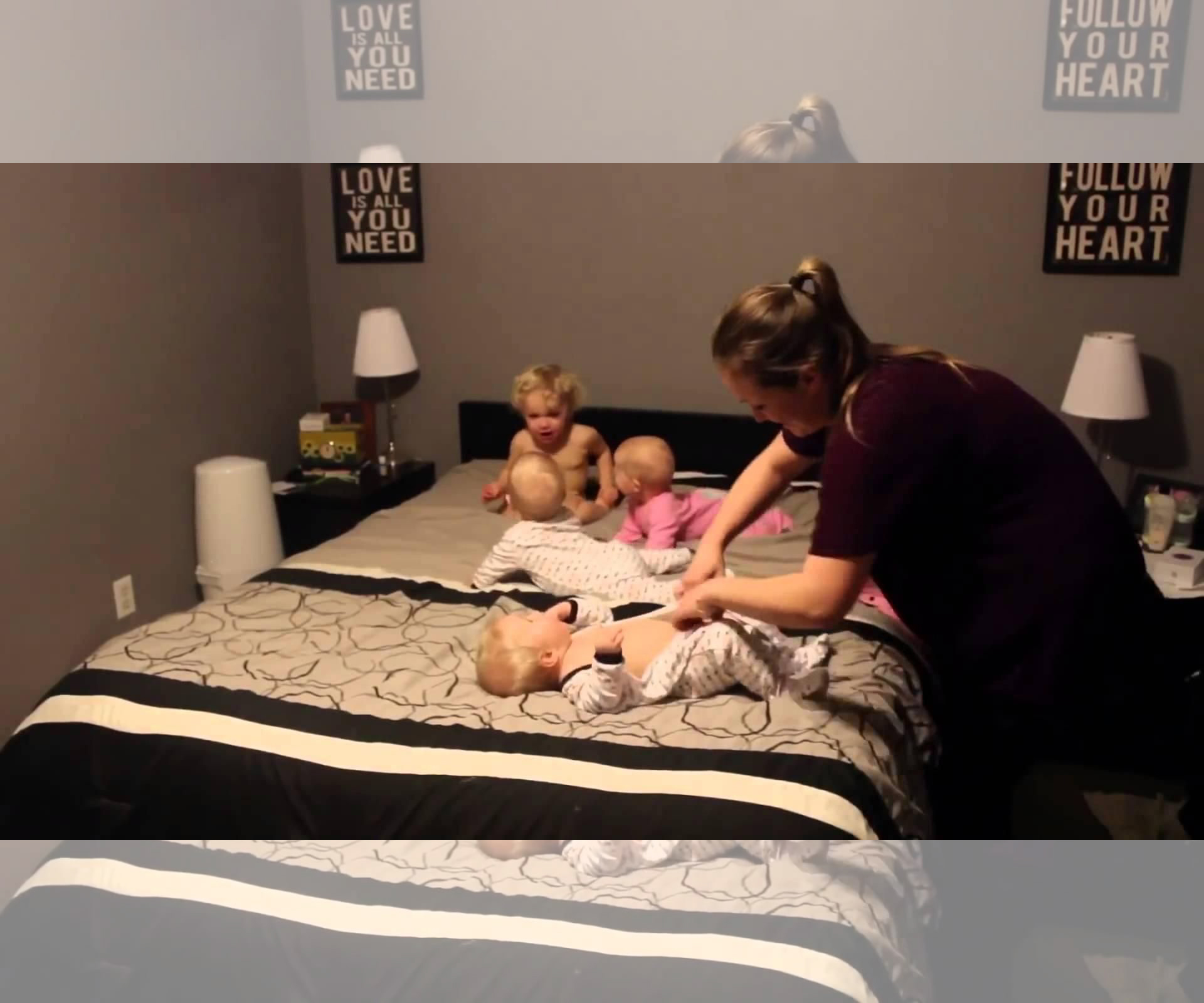 Super mum vs. triplets and toddler video goes viral