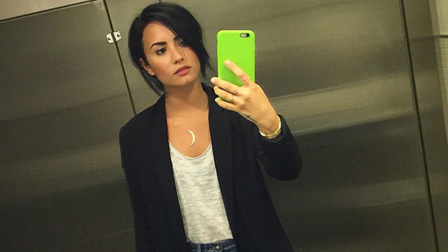 Demi Lovato covers up raunchy tattoo